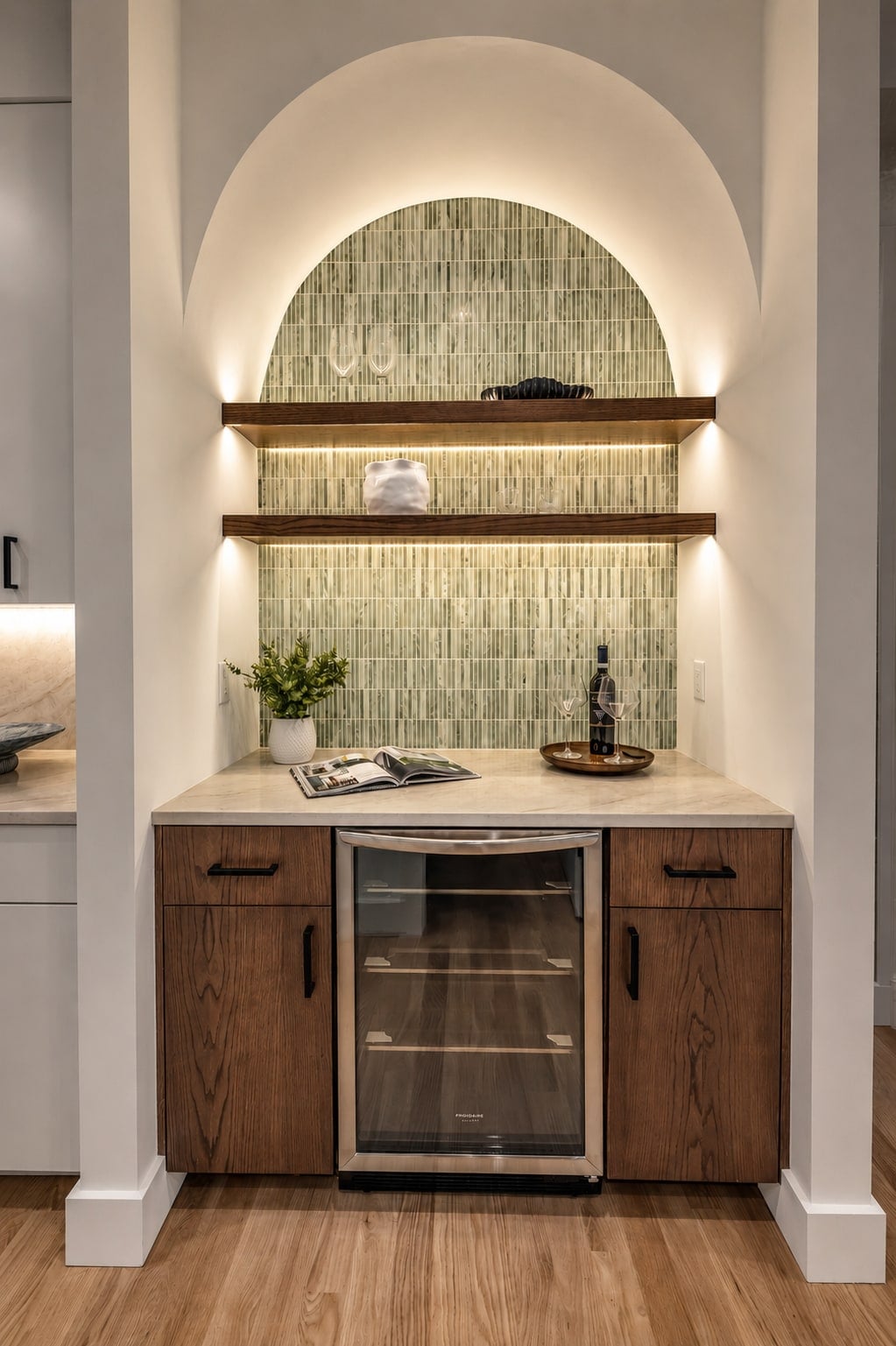 Custom butler's pantry with arched tile niche — BTA Builders
